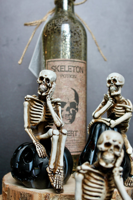 Assorted LED Resin Skeletons on Pumpkins