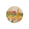 Set of round desert scene coasters with cacti by Margaret Teane, over arid landscape.