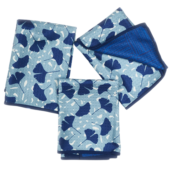 Set of three blue reversible mini towels with ginko leaf pattern and geometric backing