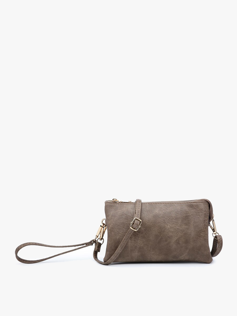 Chocolate crossbody wristlet from an unknown brand featuring gold-tone hardware and an attached strap.
