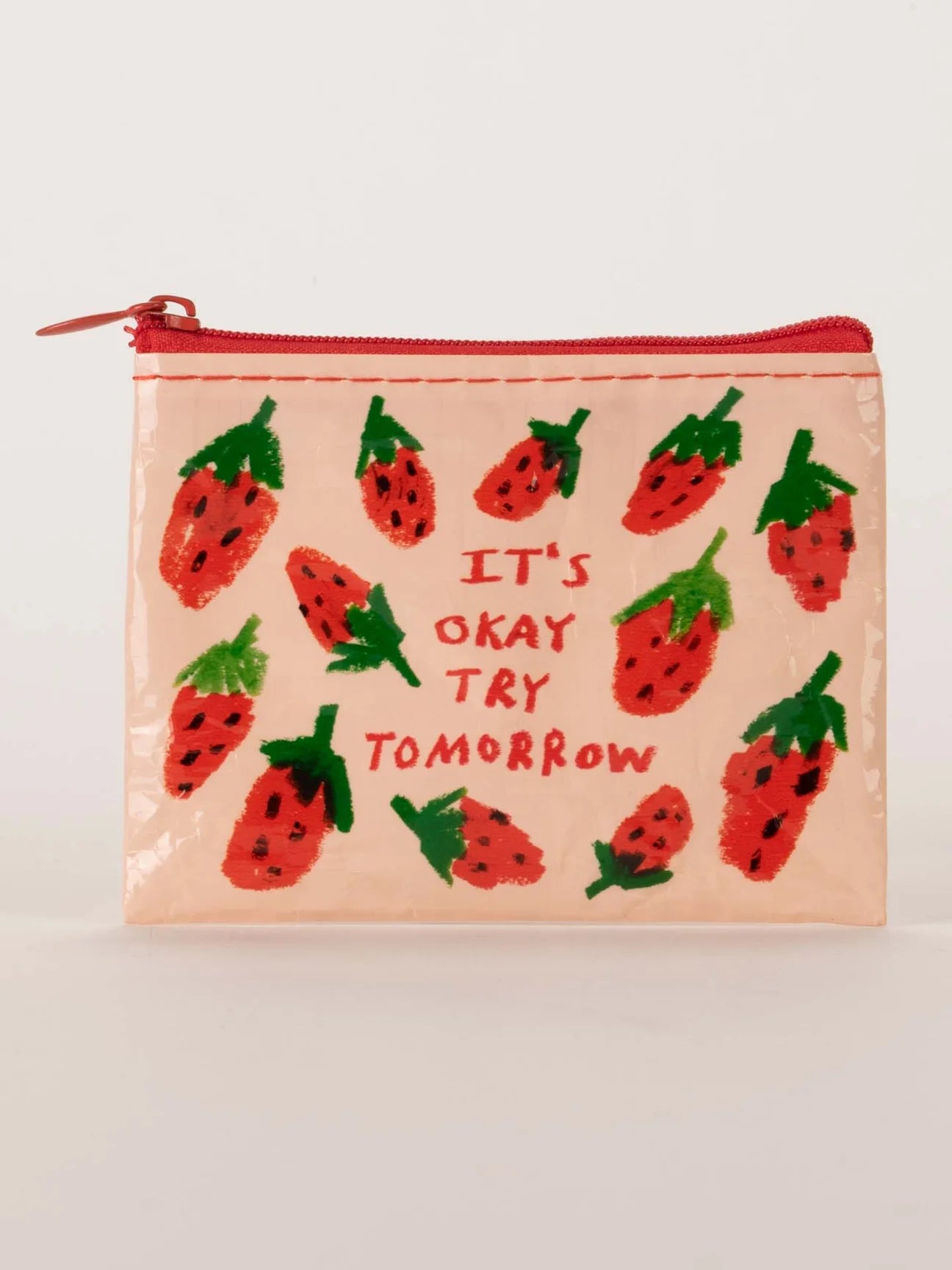 Coin pouch from Blue Q with a strawberry print and motivational text design.