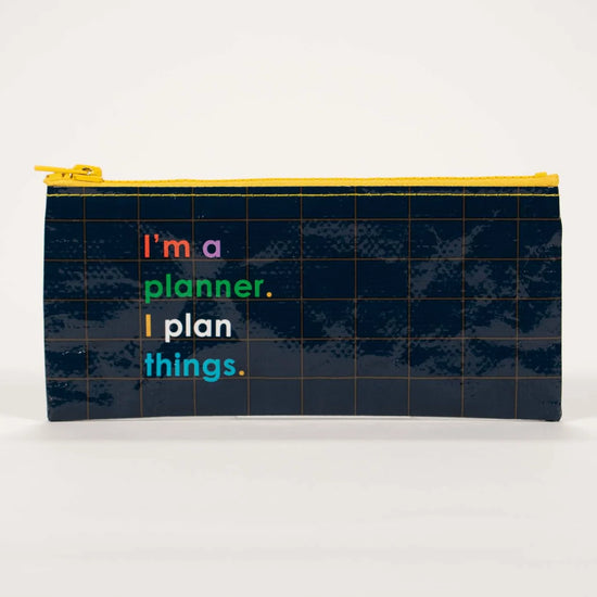 Printed pencil case by Blue Q with grid pattern and colourful text on a white background.