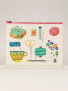 Zipper pouch from Blue Q with a sewing-themed pattern featuring a pin cushion, scissors, and buttons.
