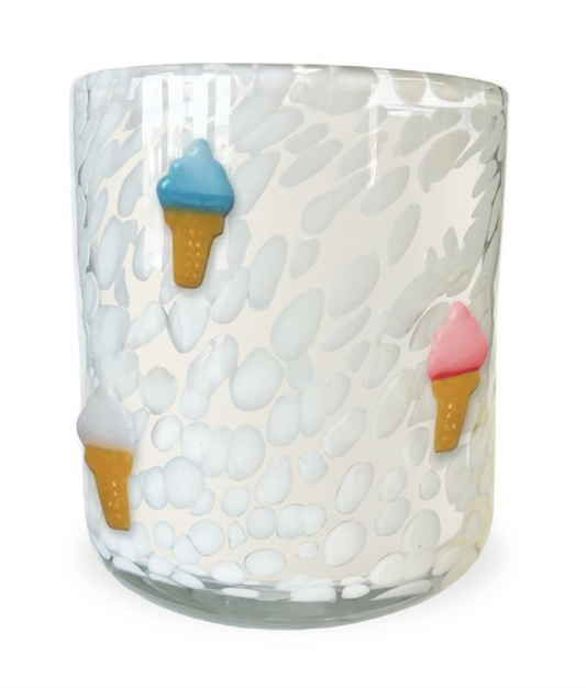 White scented candle with ice cream accents with white spotted pattern.