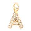 Gold letter "A" charm by Courtney with pavé stone embellishments.