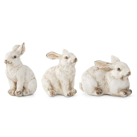 Set of small gray bunny figurines, home decor with sculpted details.