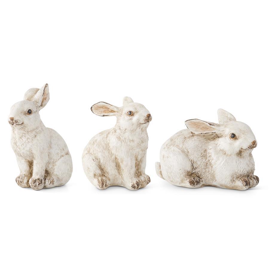 Set of small gray bunny figurines, home decor with sculpted details.