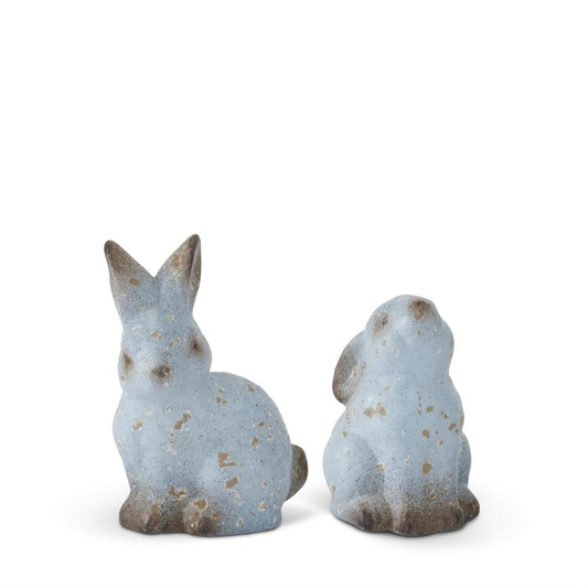 Set of blue terracotta bunnies with speckled texture.