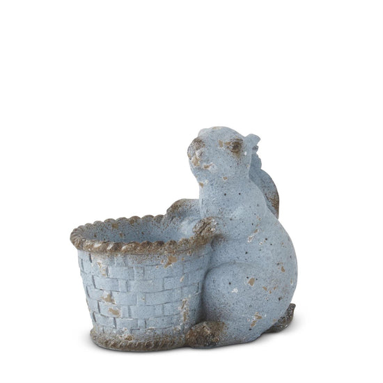 Blue terracotta bunny with basket, featuring a textured basket weave pattern.