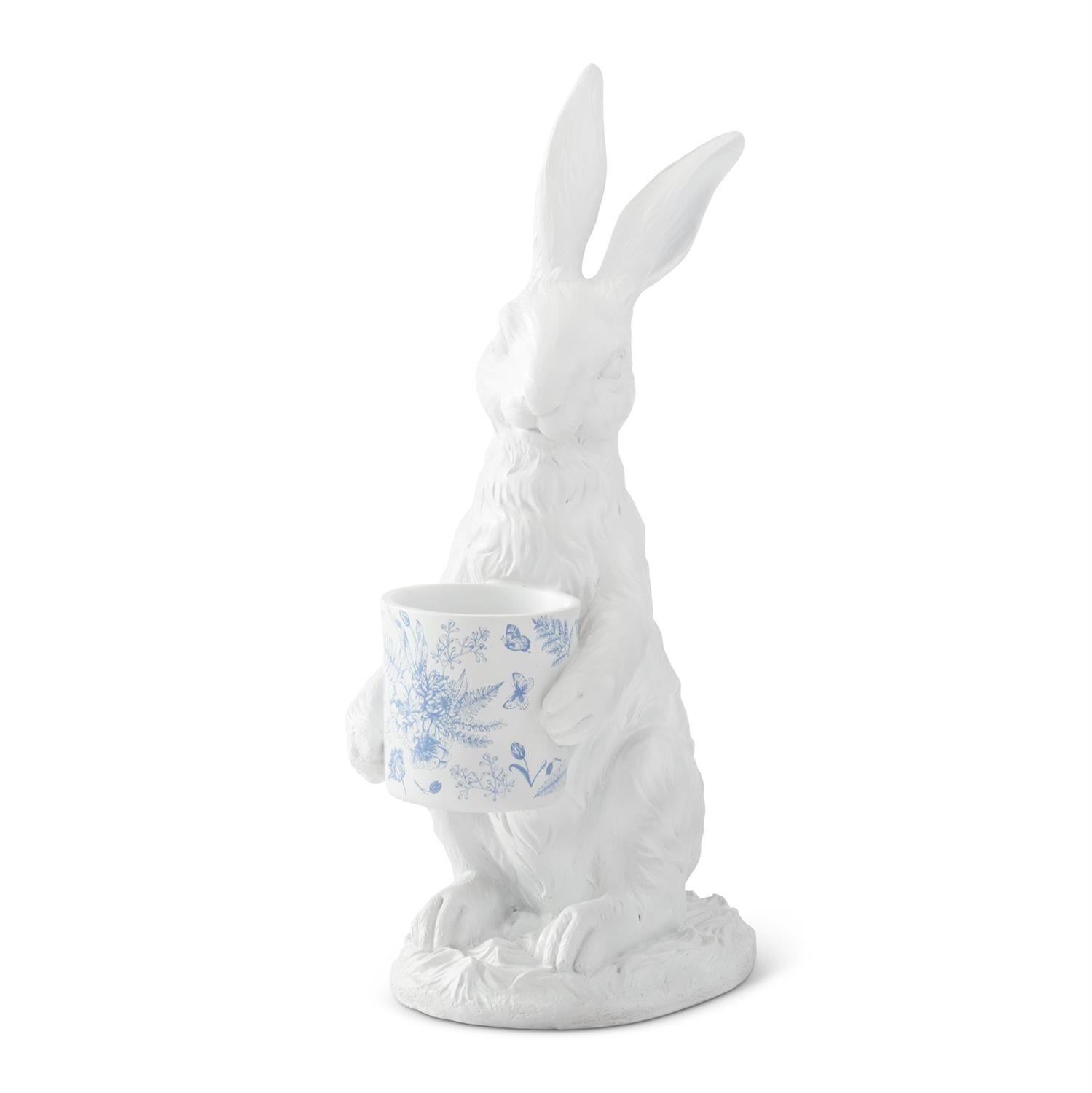 White bunny statue with blue and white floral-patterned pot by Accent Decor, standing on an oval base.
