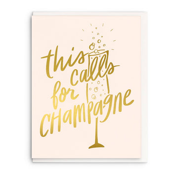 Foil congratulations card with "This calls for champagne" message, featuring an illustration of champagne glass.
