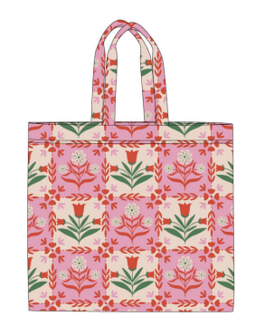 Pink floral quilted tote with tile pattern, featuring pink, red, and green floral motifs.
