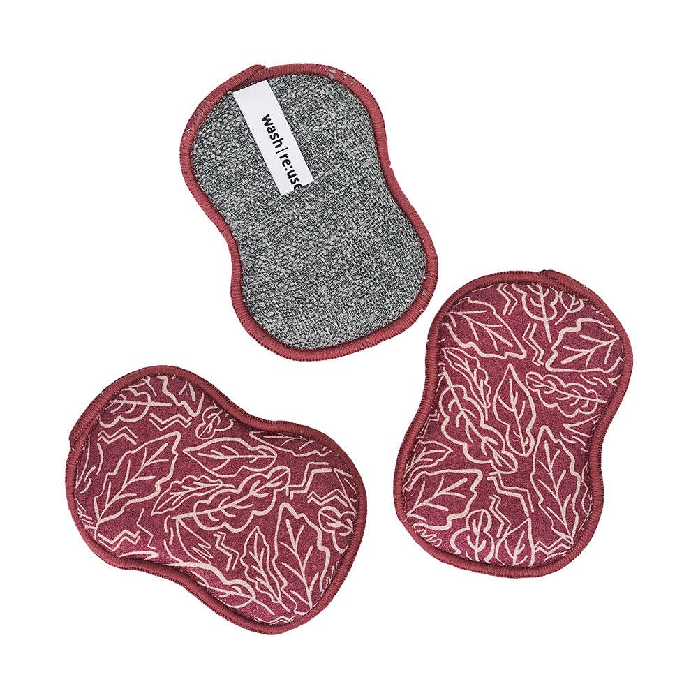 Set of three reusable sponges by ZW Blustry Day, with one gray and two wine colored with a leaf pattern.