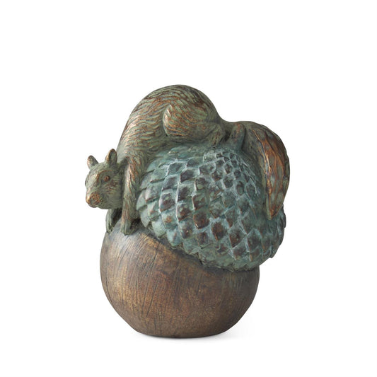 Resin squirrel decor in patina copper finish with acorn detail, standing against a white background.
