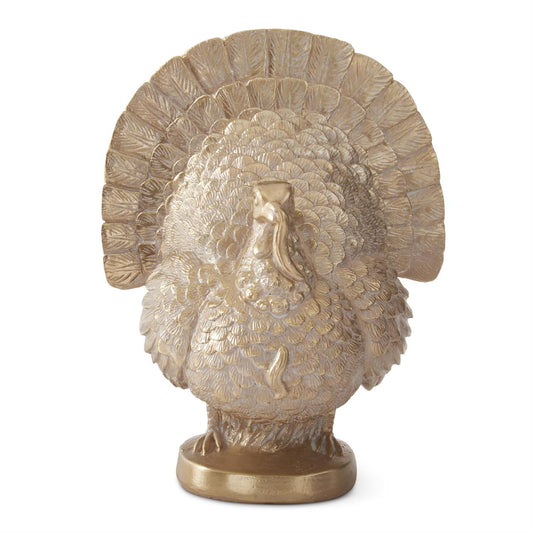 Gold resin turkey by Foreside Home and Garden with textured feathers and round base.