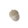 Cream and gold acorn home decor with a textured surface.
