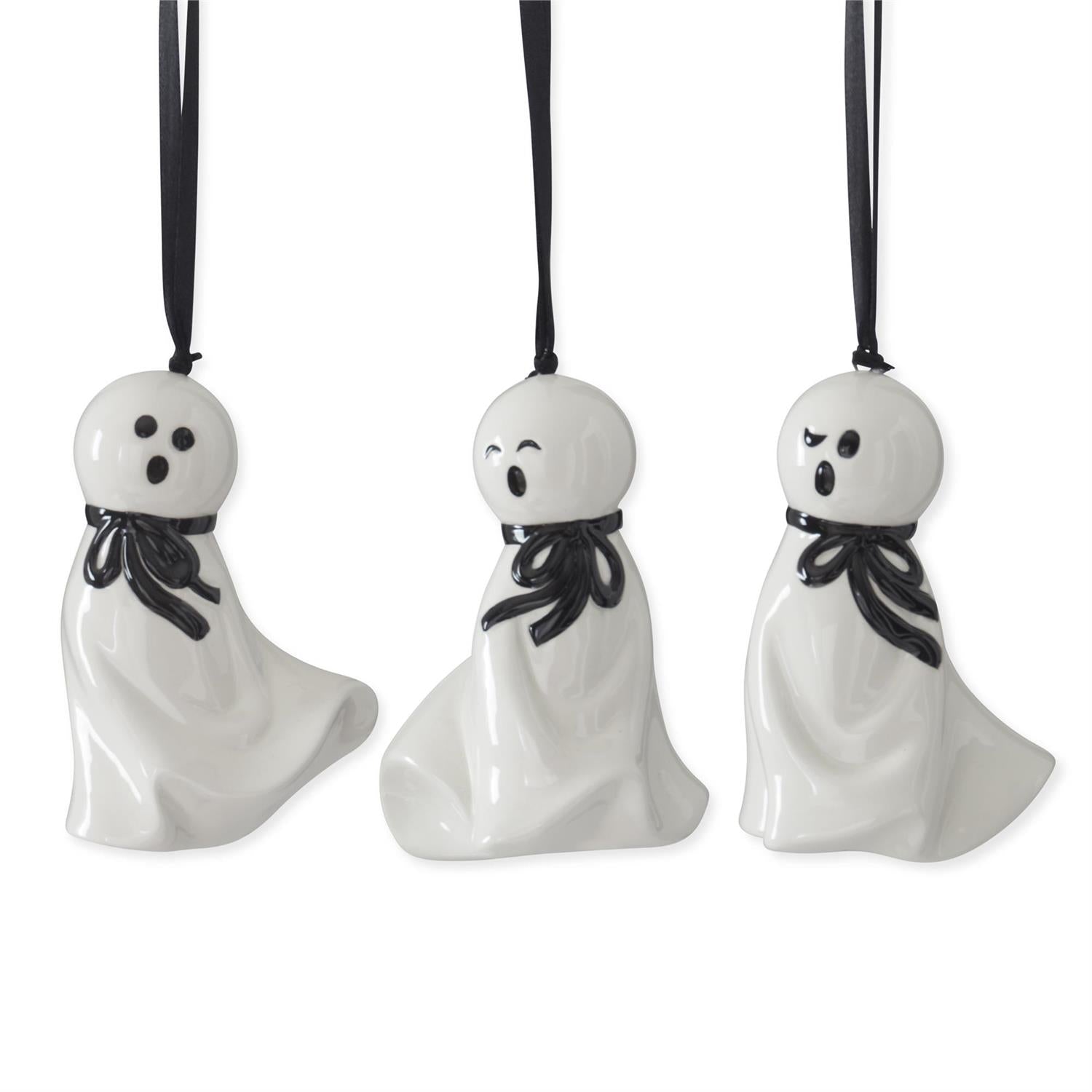 Set of three white ceramic ghost ornaments with black bows by Accent Decor.