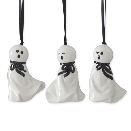 Set of three white ceramic ghost ornaments with black bows by Accent Decor.