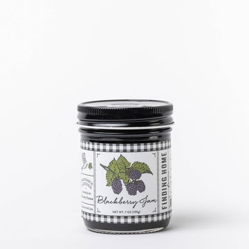 Blackberry jam by Finding Home Farms with a checkered label featuring blackberries and leaves.