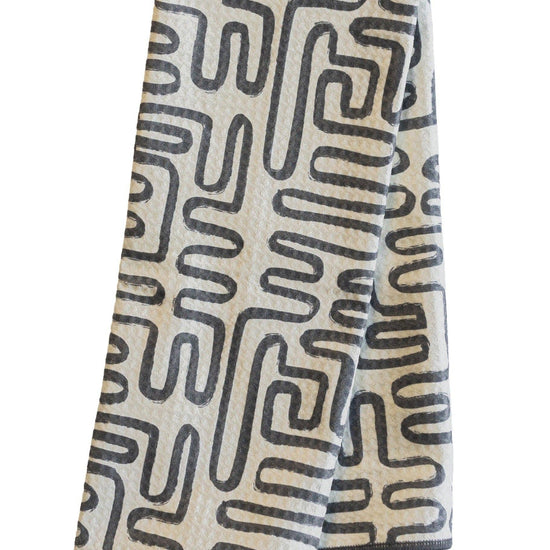 Cotton anywhere towel with doodle pattern from Shade, featuring a gray maze design on white.