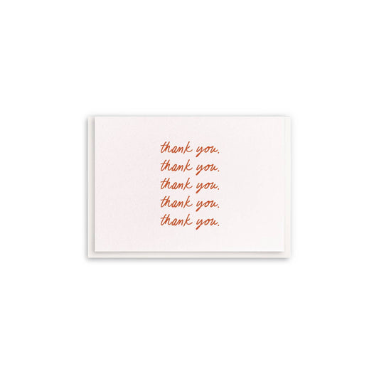 Enclosure thank you greeting card with script by The Paper Hat Co. reading "thank you" in an allover pattern.
