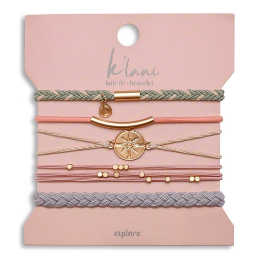 Gold charm hair tie and bracelet set by K'lani, with braided, beaded and compass charm details.