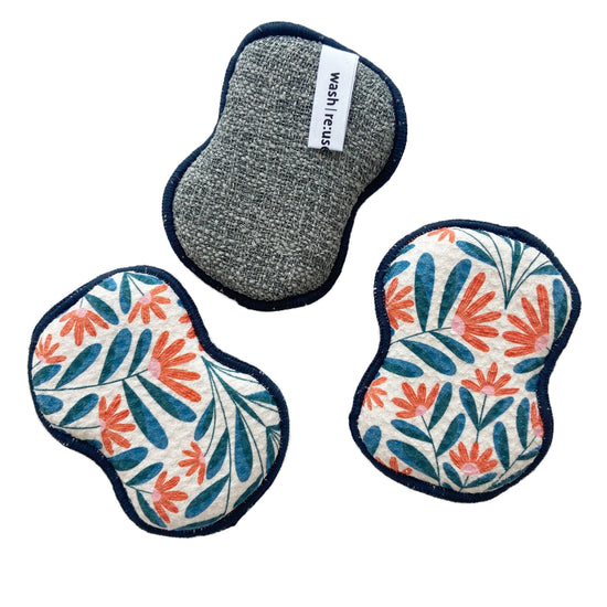Set of three reusable sponges from RJW SFlora, with one sponge in gray and two floral patterned sponges.