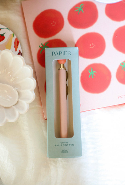 Ballpoint pen in a 'PAPIER' box with a decorative background