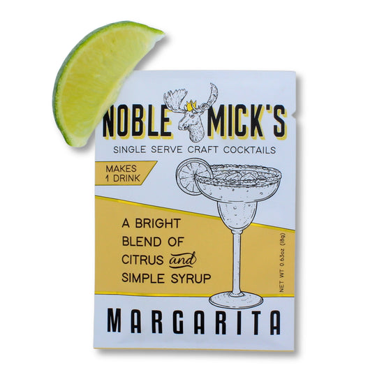 Margarita cocktail mix by Noble Mick's, with a lime wedge garnish on the product box.