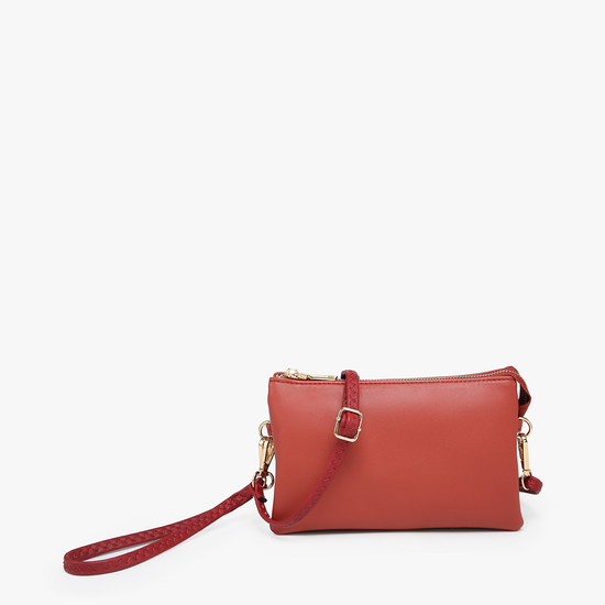 Brick red crossbody wristlet by an unknown brand with gold hardware.