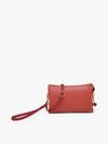 Brick red crossbody wristlet by an unknown brand with gold hardware.