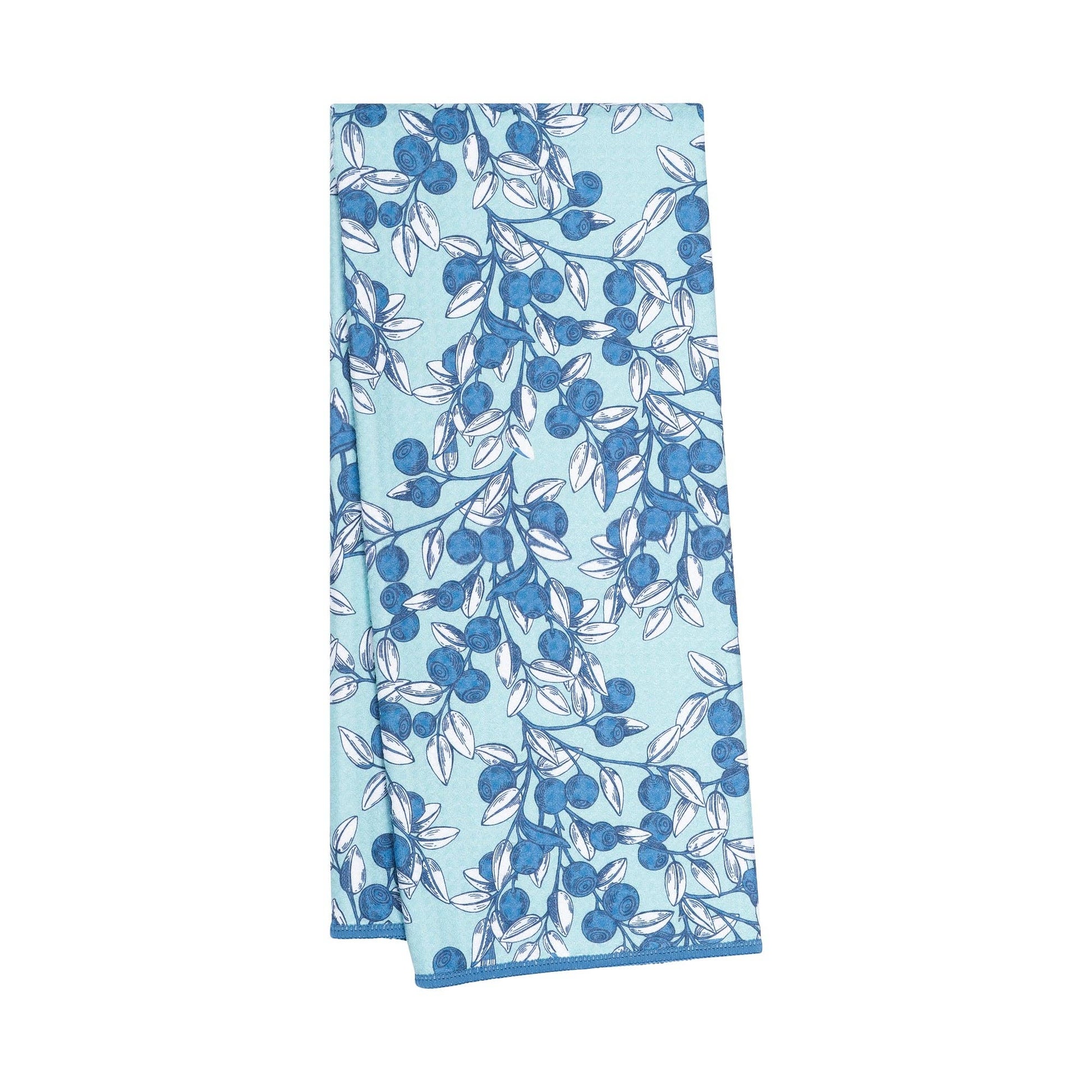 Blue "Anywhere Towel" with blueberry print from Coterie, features a white leaf pattern.