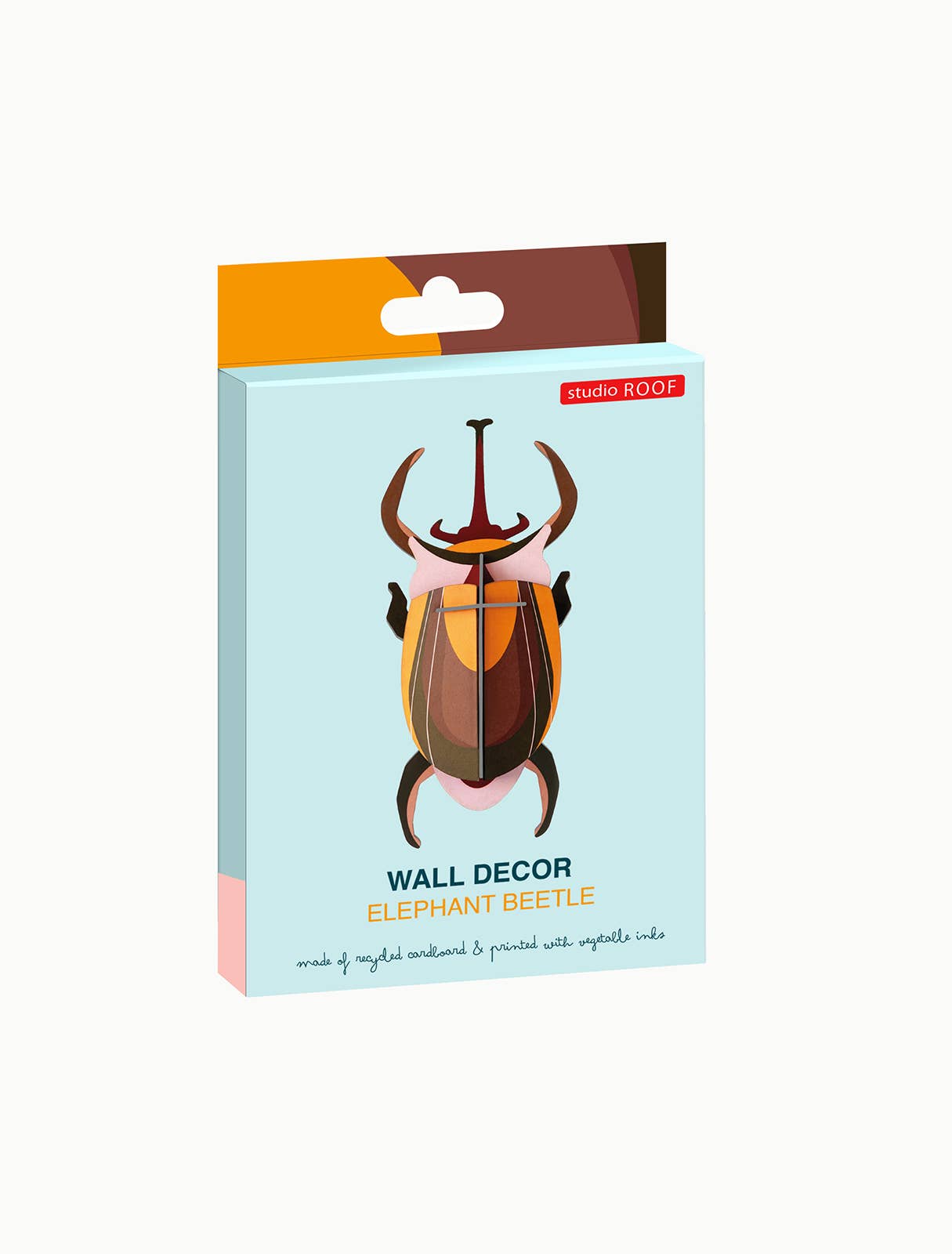 Elephant beetle wall decor by studio ROOF featuring a colorful design on recycled cardboard.