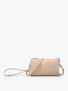 Light peach crossbody and wristlet by Monogrammable with a gold-toned zipper closure and an adjustable strap.