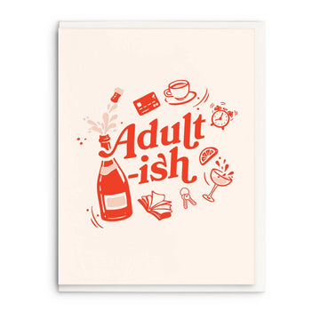 Greeting card with "Adult-ish" graphic, by Redwood & Gold, featuring a bottle, books, a cup, and other relatable icons.
