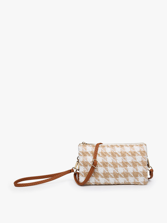 Sand and white crossbody wristlet with brown strap by unknown vendor, featuring a houndstooth pattern.