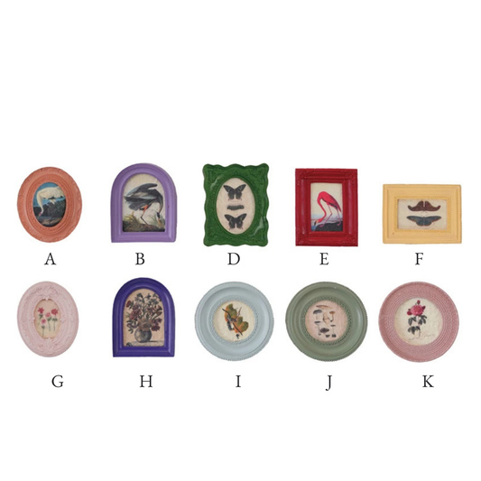 Cheery framed art magnet with various colorful borders and different floral and insect drawings inside.