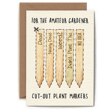 Amateur Gardener Card from unknown brand, featuring cut-out plant markers with gardening humor text on a textured background.
