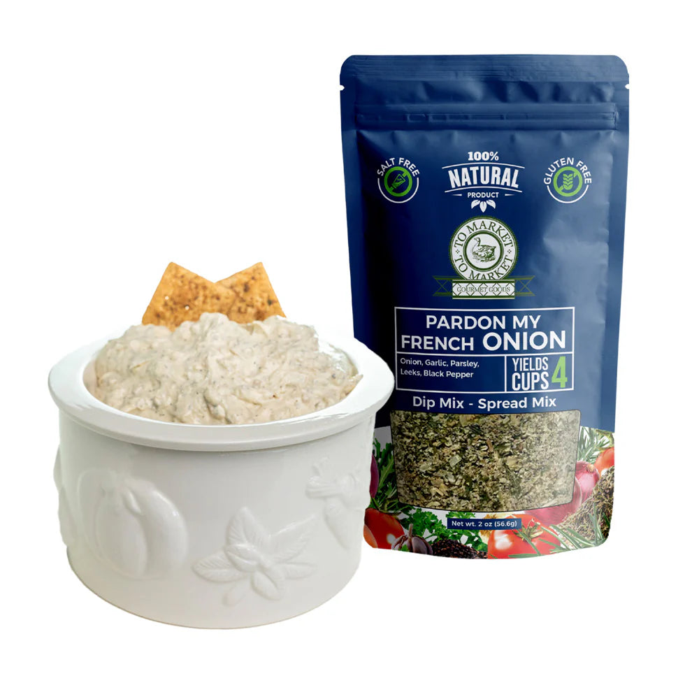 Gourmet dip mix by To Market to Market, next to a white bowl filled with dip and chips.
