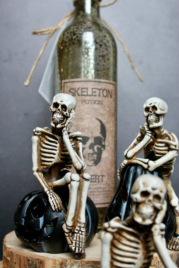 Assorted LED Resin Skeletons on Pumpkins