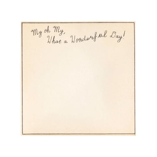 Square notepad with "My oh My, What a Wonderful Day!" inscription, on an off-white paper with a black border.