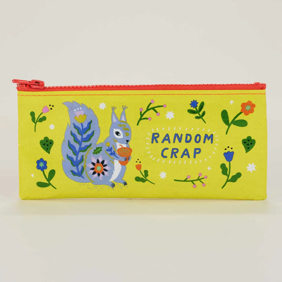 Yellow pencil case by Blue Q with squirrel illustration and "Random Crap" text graphic.
