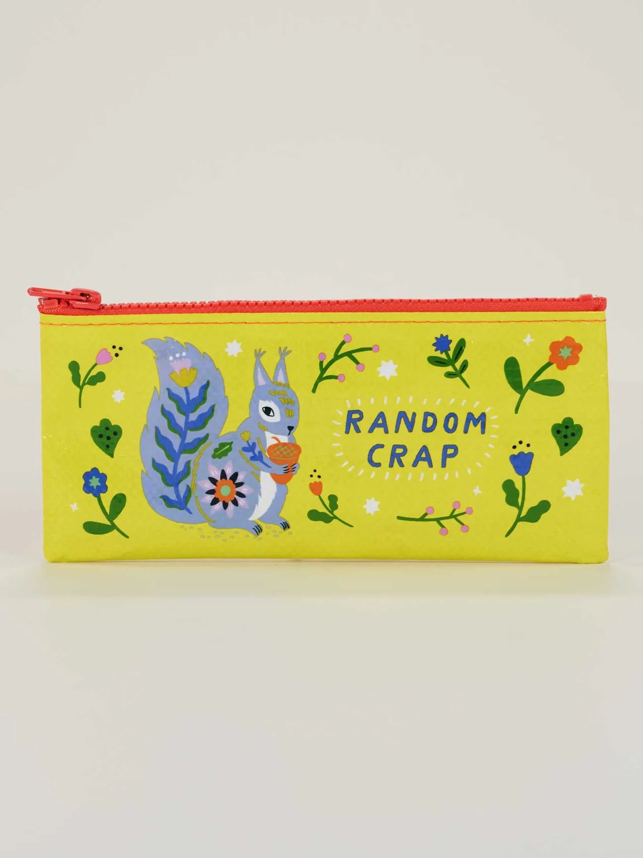 Yellow pencil case by Blue Q with squirrel illustration and "Random Crap" text graphic.