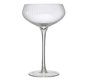 Clear glass champagne coupe with ribbed details.