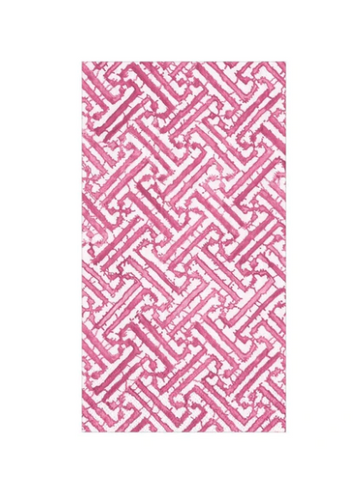 Set of fretwork guest napkins with pink pattern.