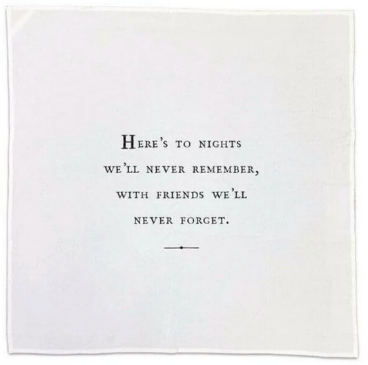 White cotton dishtowel by Sugarboo, displaying a printed quote and a small line design.