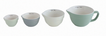 Set of stoneware measuring cups with pour spouts by Thirstystone, in graduated sizes and muted pastel colors.
