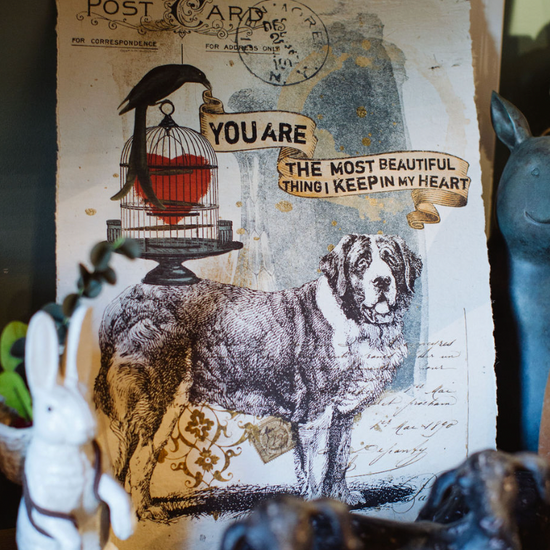Paper print from In the Land of Elsewhere, featuring a Saint Bernard dog and birdcage heart.
