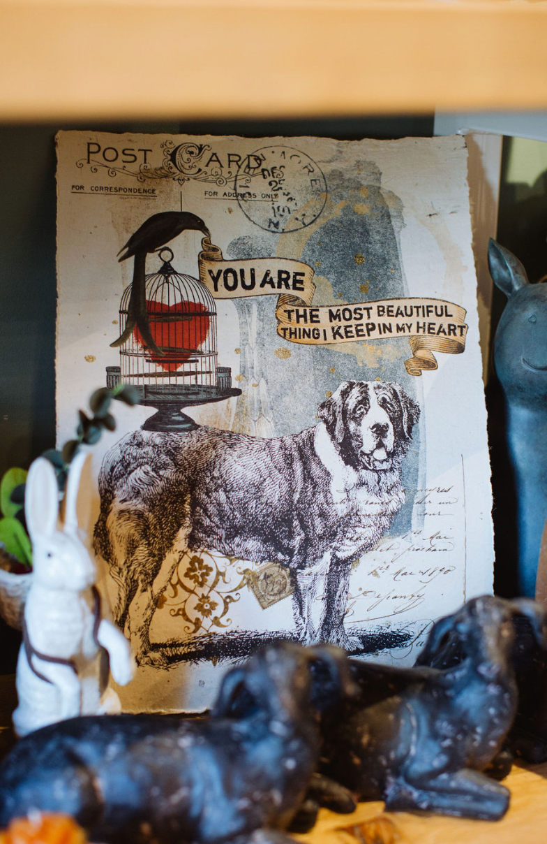 Paper print from In the Land of Elsewhere, featuring a Saint Bernard dog and birdcage heart.
