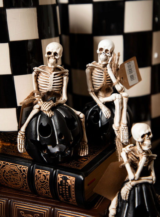 Assorted LED Resin Skeletons on Pumpkins